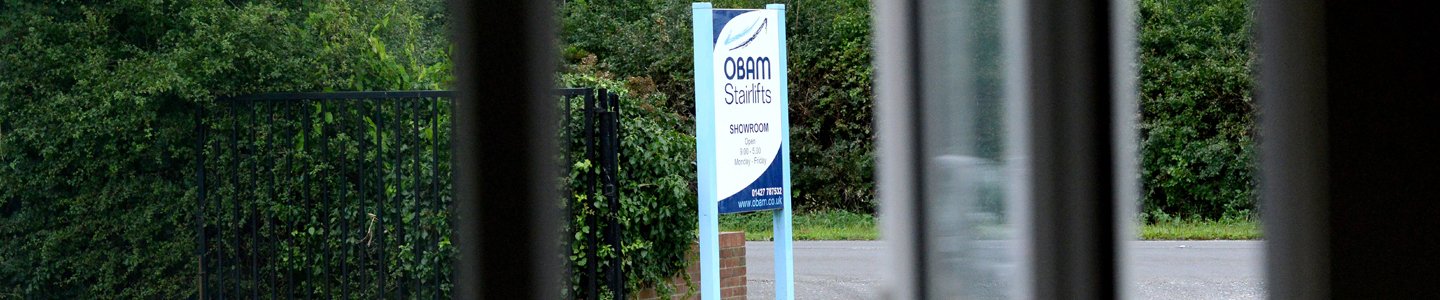 Photo of the Obam Stairlifts Sign viewed from the Showroom