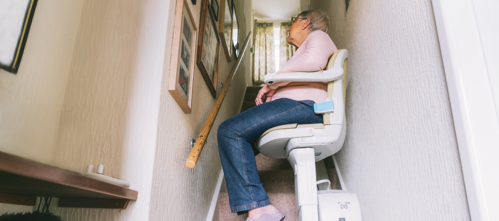 Woman using Stairlift