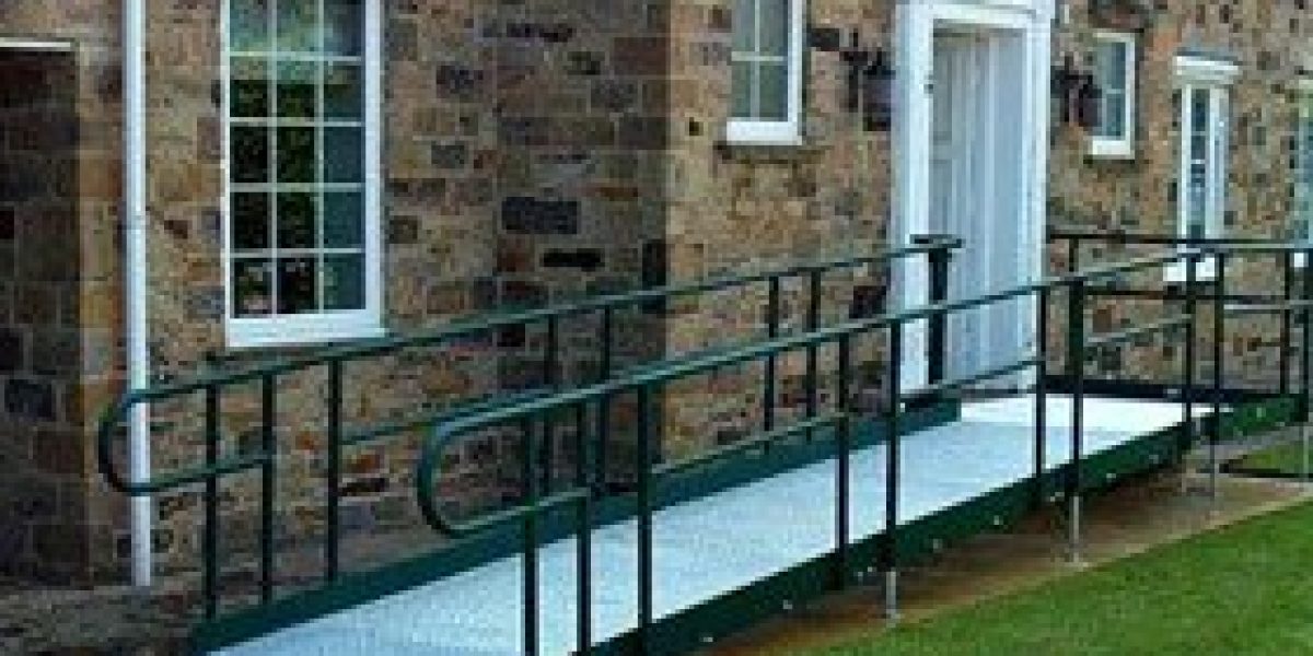 picture of a modular metal ramp installation with green handrails